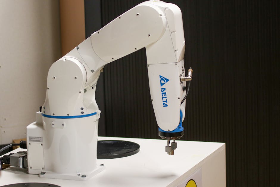 Close-up of a Delta brand robotic arm in an industrial setting, showcasing automation technology.