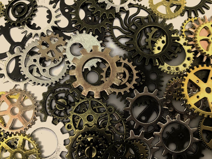 Close-up view of various interlocking gears showcasing intricate industrial design and precision.